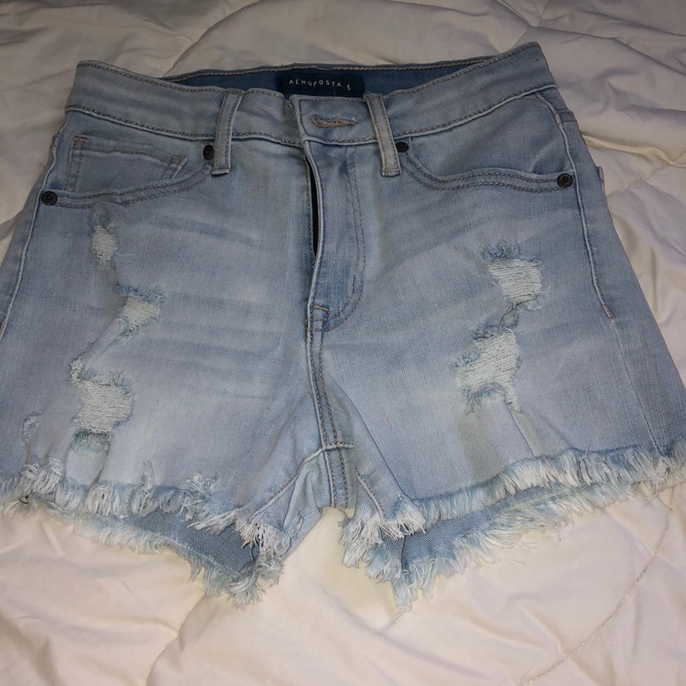 white washed ripped jean shorts